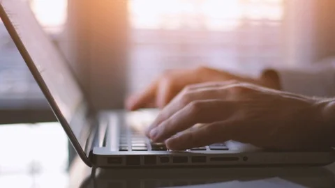 Close up of hands typing on keyboard, writing email or  working on computer Stock Footage 93643940