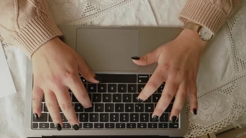 Close-Up of Hands Typing on Laptop Stock Footage 261012513