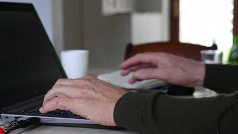 Close up of hands typing on a laptop home office 動画素材 237938774