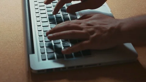 Close up of hands typing on laptop keyboard Stock Footage 98411062