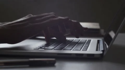 Close up hands typing on laptop keyboard. Person works in office on computer Video stock 152168251