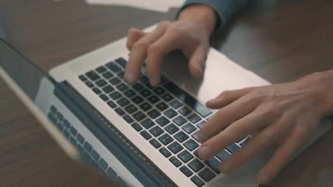 Close Up of Hands Typing on Laptop Keyboard Stock Footage 222033910