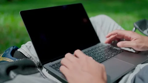 Close-up of hands typing on laptop keyboard.  Stock Footage 283186651