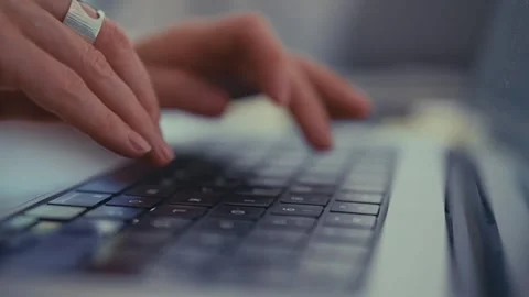 Close-Up of Hands Typing on Laptop Keyboard Stock Footage 304684846