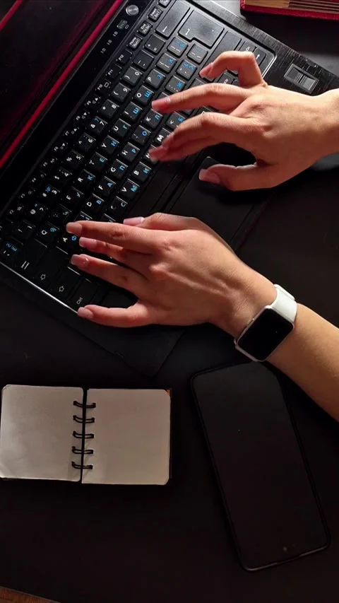 Close-Up of Hands Typing on Laptop Keyboard Stock Footage 307844988