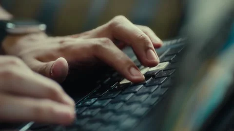 Close-up of hands typing on laptop keyboard Stock Footage 324859351
