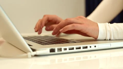 Close up of hands typing on laptop keyboard, working on computer, modern of.. Stock Footage 339646521