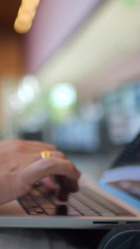 Close-Up of Hands Typing on Laptop Keyboard in Modern... Stock Footage 344455151
