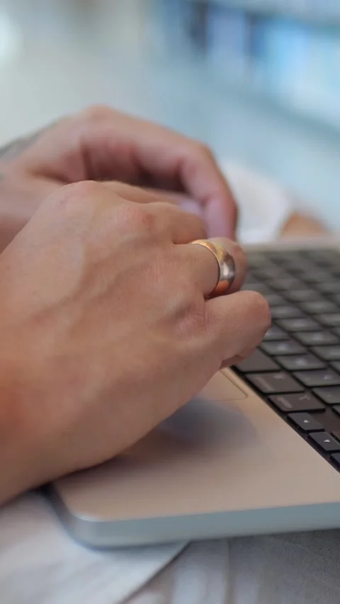 Close-Up of Hands Typing on Laptop Keyboard, Modern... Stock Footage 344455160