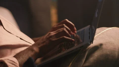 Close-Up of Hands Typing on Laptop Keyboard on Home Couch Video stock 346007567