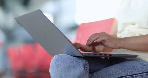 Close-up of hands typing on a laptop while working remotely, online busines.. Stock Footage 340607017
