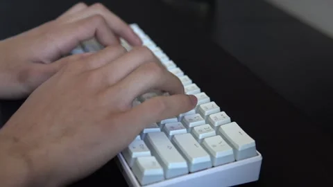 Close Up of Hands Typing on Minimalist White Mechanical Keyboard Stock Footage 341707147