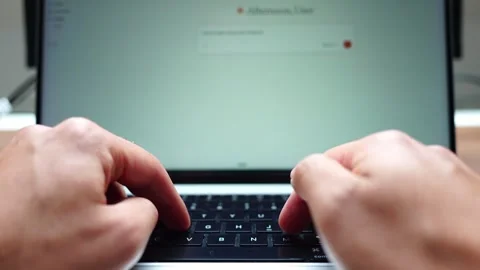 Close up of hands typing in a prompt in Claude Chat using Opus 4.7. Stock Footage 334962182