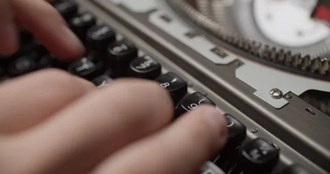 Close-Up of Hands Typing on Vintage Red Typewriter Stock Footage 308365683