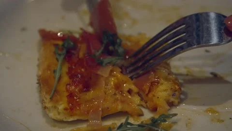 Close up of hands of unknown woman slice piece of pizza cut in the plate eati Stock Footage 221456361