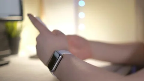 Close-up hands of unrecognizable businessman using mobile phone sitting at desk Stock Footage 236189927