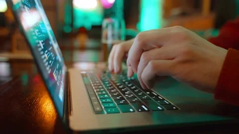 Close-up of the hands of an unrecognizable guy typing on a computer keyboard. Stock Footage 232385256