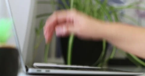 Close-up of hands of unrecognizable man turning off laptop and closing lid of Stock-Footage 300364157