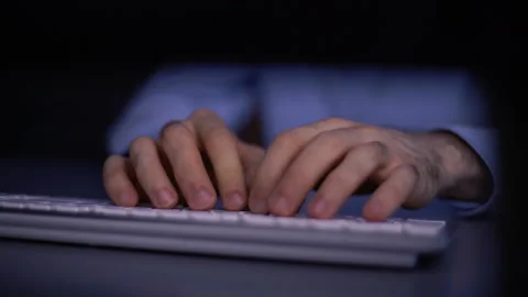 Close-up hands of unrecognizable man writing message to social network on Video stock 146353226