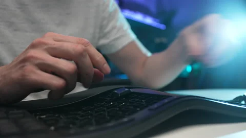 Close-up hands of unrecognizable repairman assembling disassembled keyboard Stock Footage 238977343
