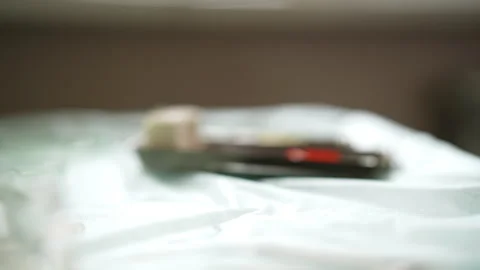 Close-up hands of unrecognizable trichologist places on table nozzle from Ugraft Stock Footage 277756902