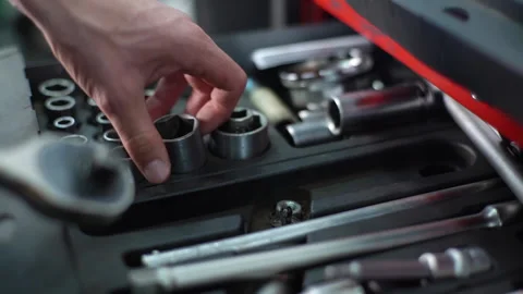 Close-up hands of unrecognizable worker man opening toolbox with auto car tools Video stock 161956375