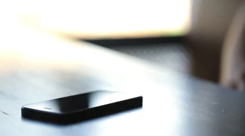 Close up hands uses phone in cafe Video stock 56579532