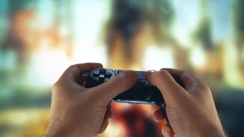 Close-up of hands using controller playing video games. Stock Footage 222181935