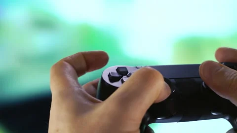 Close-up of hands using controller playing video games. Stock Footage 222206839