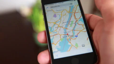 Close-Up Of Hands Using Google Maps In Smart Phone Stock Footage 55551646