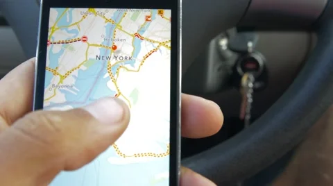 Close-Up Of Hands Using Google Maps In Smart Phone Stock Footage 66579820