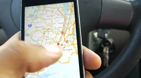 Close-Up Of Hands Using Google Maps In Smart Phone Stock Footage 66690186