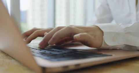 Close up of hands using laptop at work Stock Footage 207353831