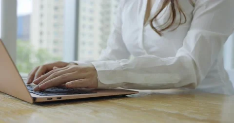 Close up of hands using laptop at work Stock Footage 207353837