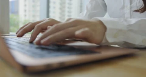 Close up of hands using laptop at work Stock Footage 207353935