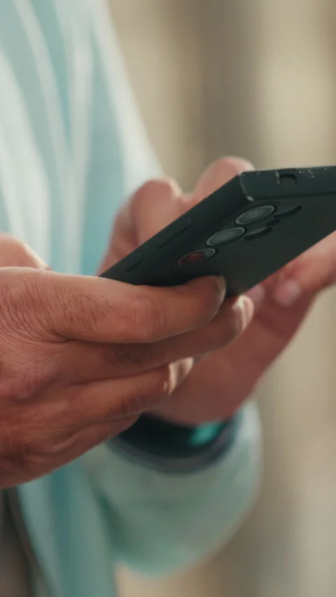 Close-Up of Hands Using Modern Smartphone Stock Footage 329933771