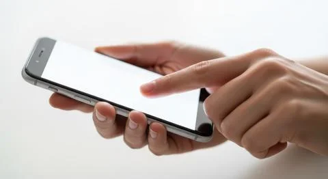 Close up of hands using a modern smartphone touching the blank screen for a.. Stock Illustration