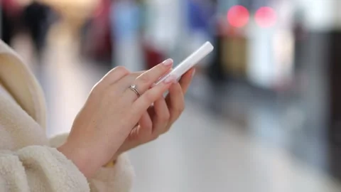 Close-up of hands using smartphone Stock Footage 345866484