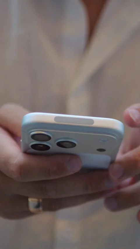 Close-Up of Hands Using Smartphone Indoors, Solving Everyday Tasks... Stock Footage 344455254