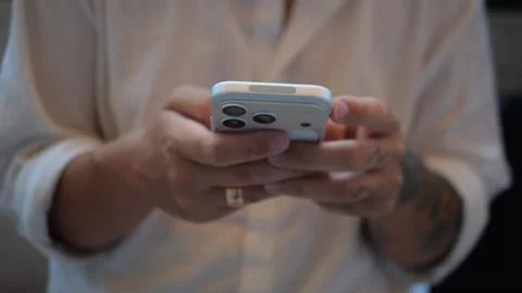 Close-Up of Hands Using Smartphone. Mobile Technology Concept for... Stock Footage 334437145