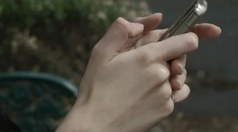 Close up of hands using smartphone outdoors Video stock 49181688