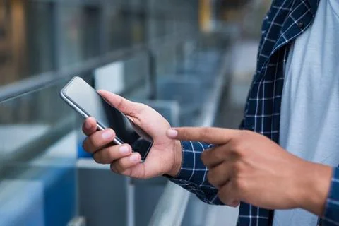 Close up hands using smartphone Stock Photos