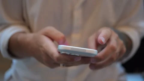 Close-Up of Hands Using Smartphone Touchscreen, Mobile Technology... Vídeo Stock 334437116