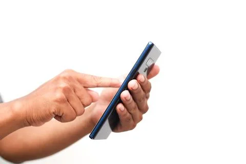 Close up of hands using a smartphone on a white background with a clear foc.. Foto stock