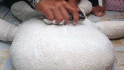 Close up of hands washing clothes or white cloth using a brush Stock Footage 321979246