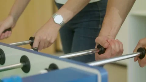 Close up hands who play table football Stock Footage 203897365