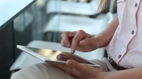 Close up of hands of woman using digital tablet computer device Stock Footage 98099724