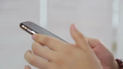 Close up of hands woman using her cell phone. indoor Stock-Footage 93379680