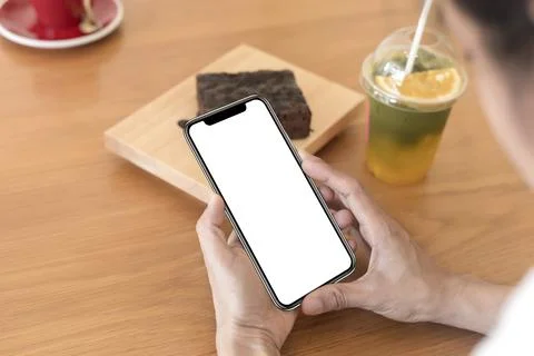 Close up hands of woman using mobile phone, cell phone in coffee shop. Hands  Stock Photos