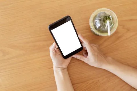 Close up hands of woman using mobile phone, cell phone in coffee shop. Hands  Stock Photos